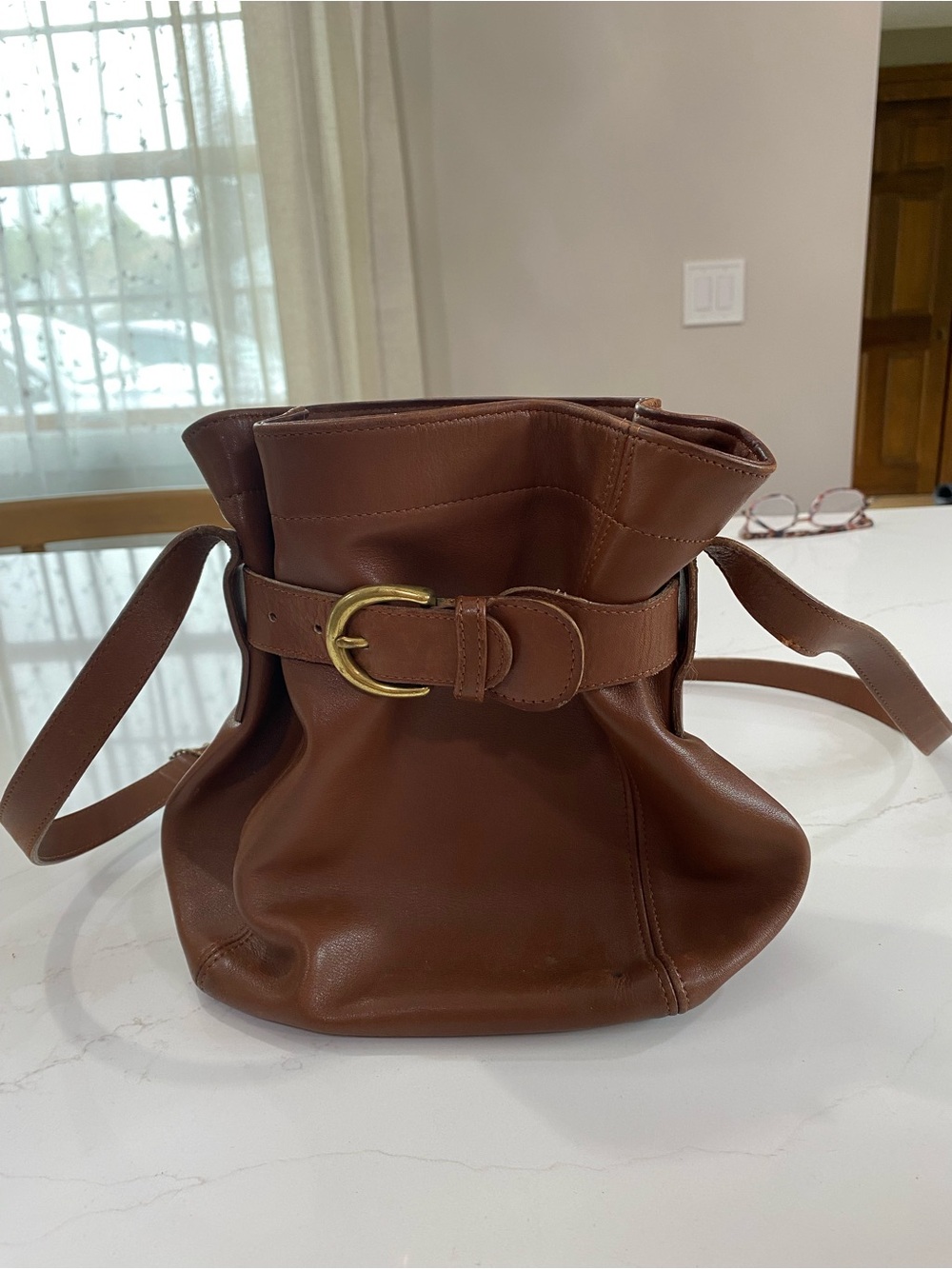 Brown Leather Bucket Bag with Belt Accent